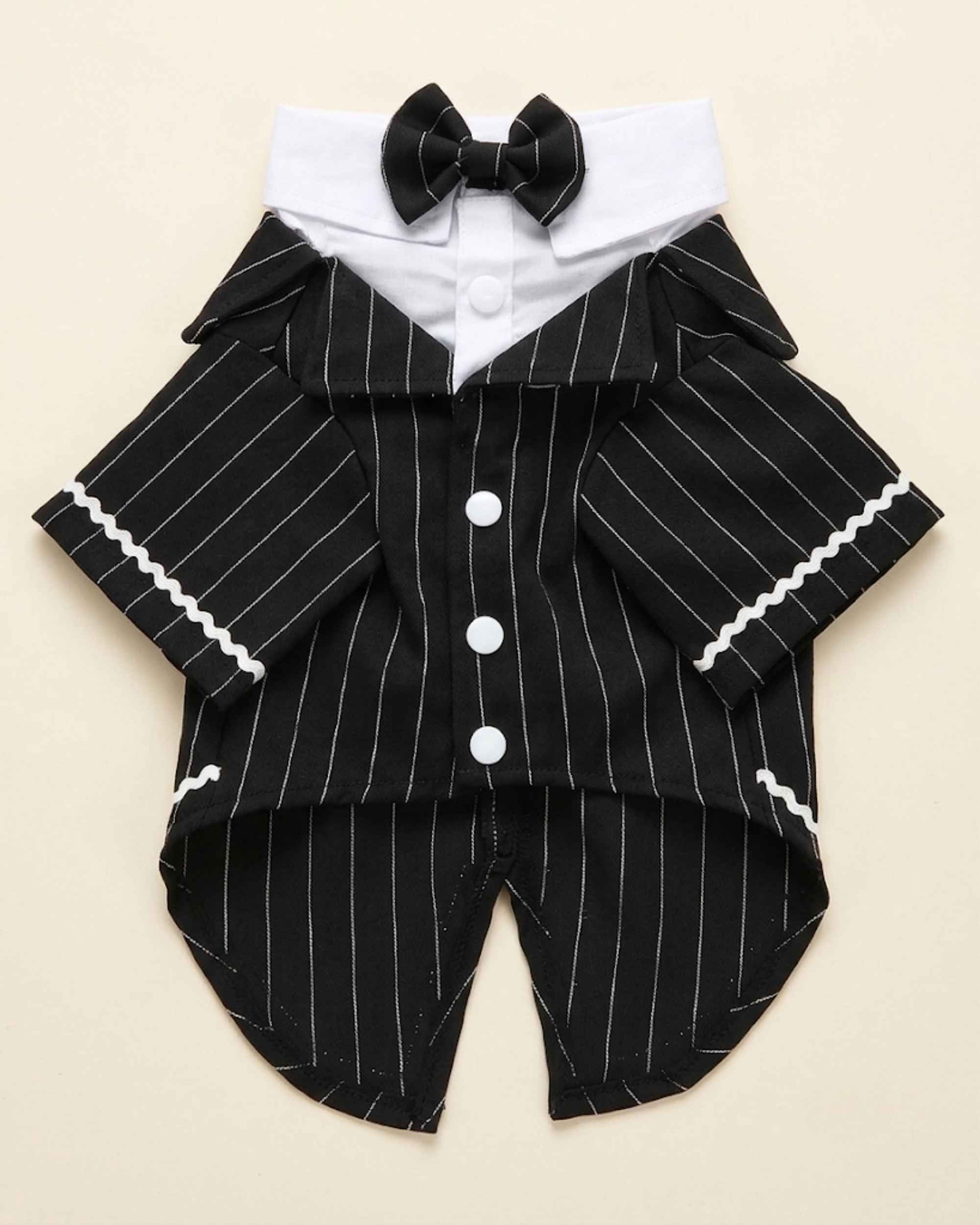 Front flat lay of the Midnight Black pinstripe pet tailcoat with bow tie, white collar, sleeves and three snap buttons