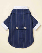 Back flat lay of the Navy Blue pinstripe pet suit with white cuffs, centre vent and two decorative silver buttons