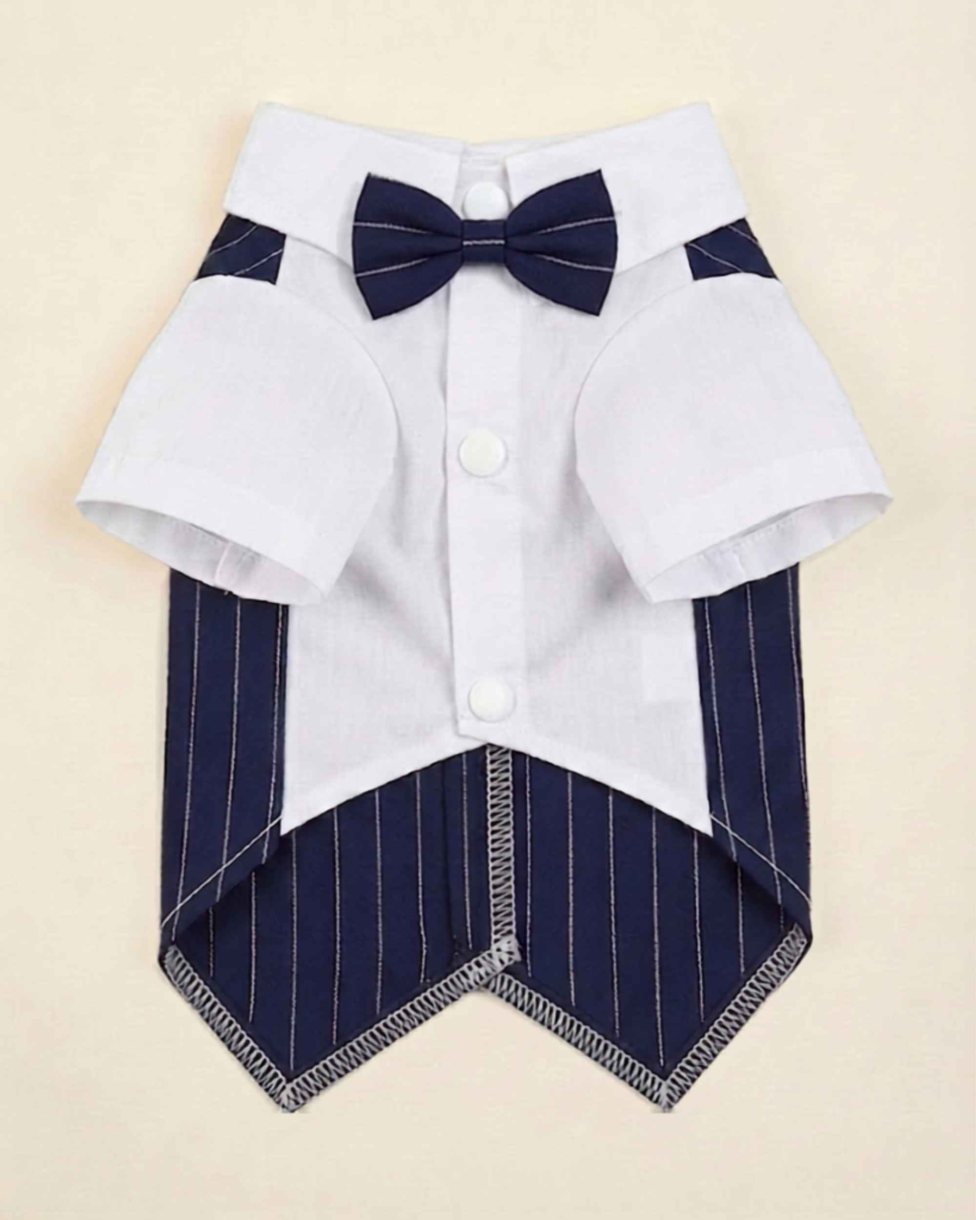 Closure-side flat lay of the navy pinstripe pet waistcoat with white shirt, matching bow tie, snap buttons and finished pointed hem
