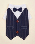 Front flat lay of the navy pinstripe bow tie pet waistcoat with white shirt, two brown buttons, faux pockets and pointed hem