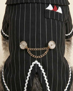 Close-up of the Midnight Black pinstripe tailcoat with metallic buttons, double gold-tone chain and pocket detail